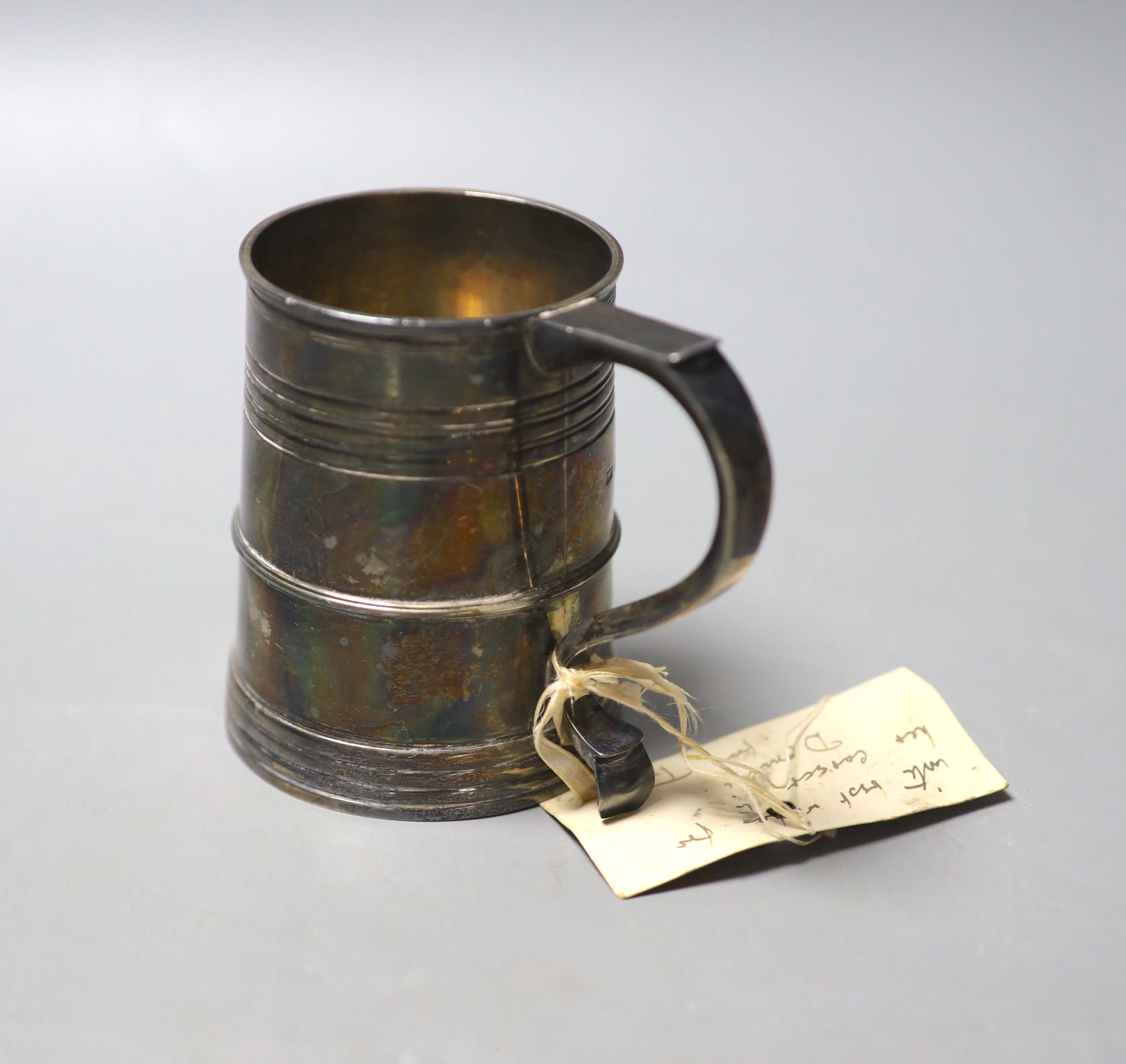 A George V reeded silver christening mug, Mappin & Webb, London, 1924, 91mm, 9oz.